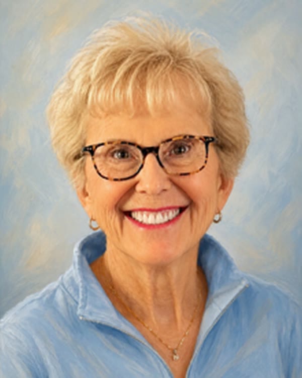 The same classmate today, smiling, in a recent color portrait she sent in.